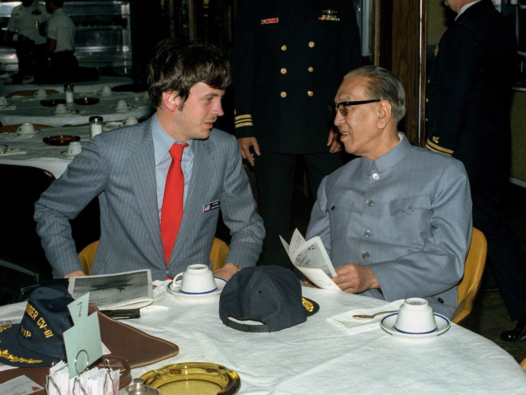 Geng and US official speak aboard USS Ranger